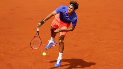 Roger Federer keeps up serene progress at French Open
