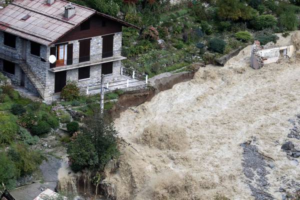 Two killed and 25 rescued after severe floods in Italy and France