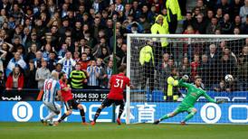 Huddersfield roar to famous win over lacklustre Man United