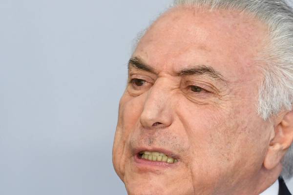 Brazil’s president criticises prosecutors over corruption charge