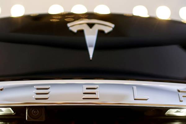 Tesla burns through less cash than expected in second quarter