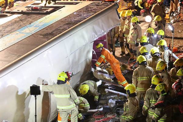 At least 18 dead and dozens hurt in Hong Kong bus crash