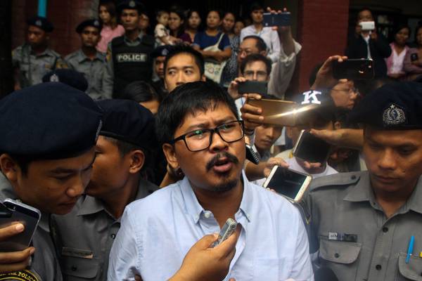 Myanmar court files secrets act charges against Reuters reporters