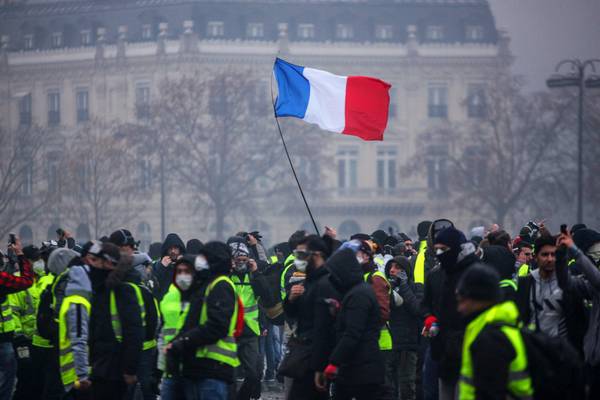 French government suspends fuel tax rises after riots