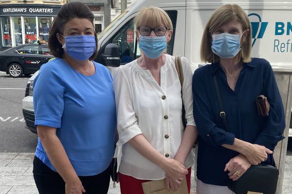 ‘I can’t really breathe . . . but you have to wear it’: Cork shoppers comply with new face covering rules